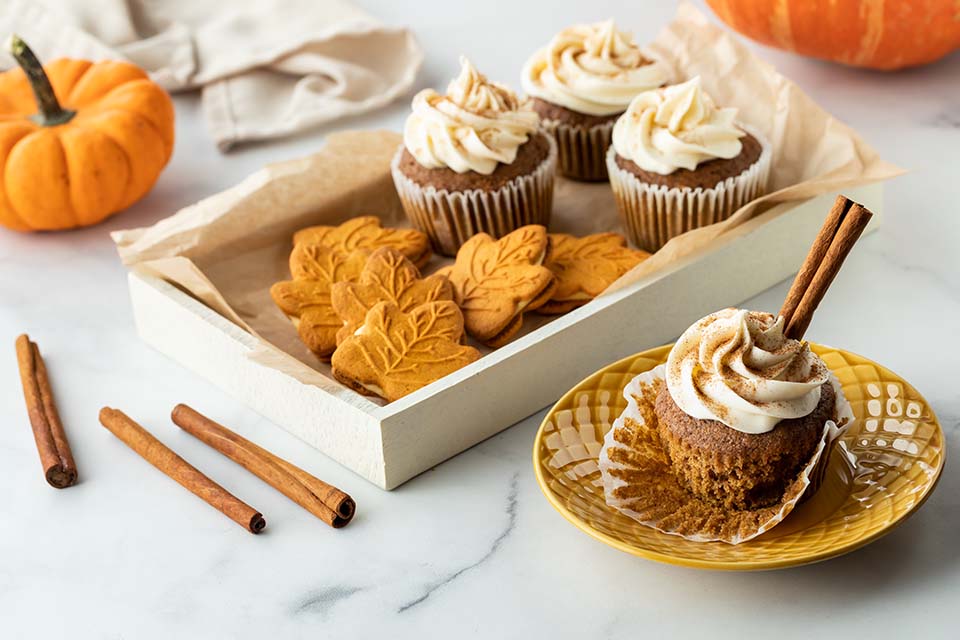 Cupcakes with cinnamon sticks and buttercream frosting