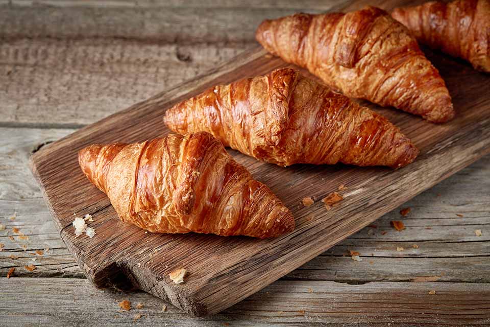 Croissants on cutting board